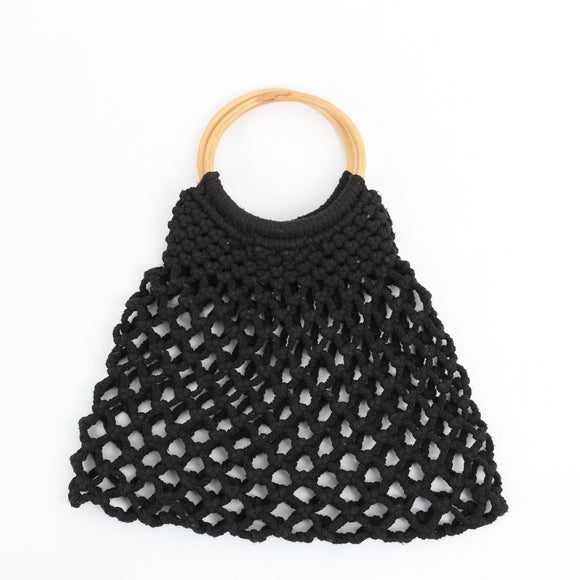 Black woven bag with wooden ring handles